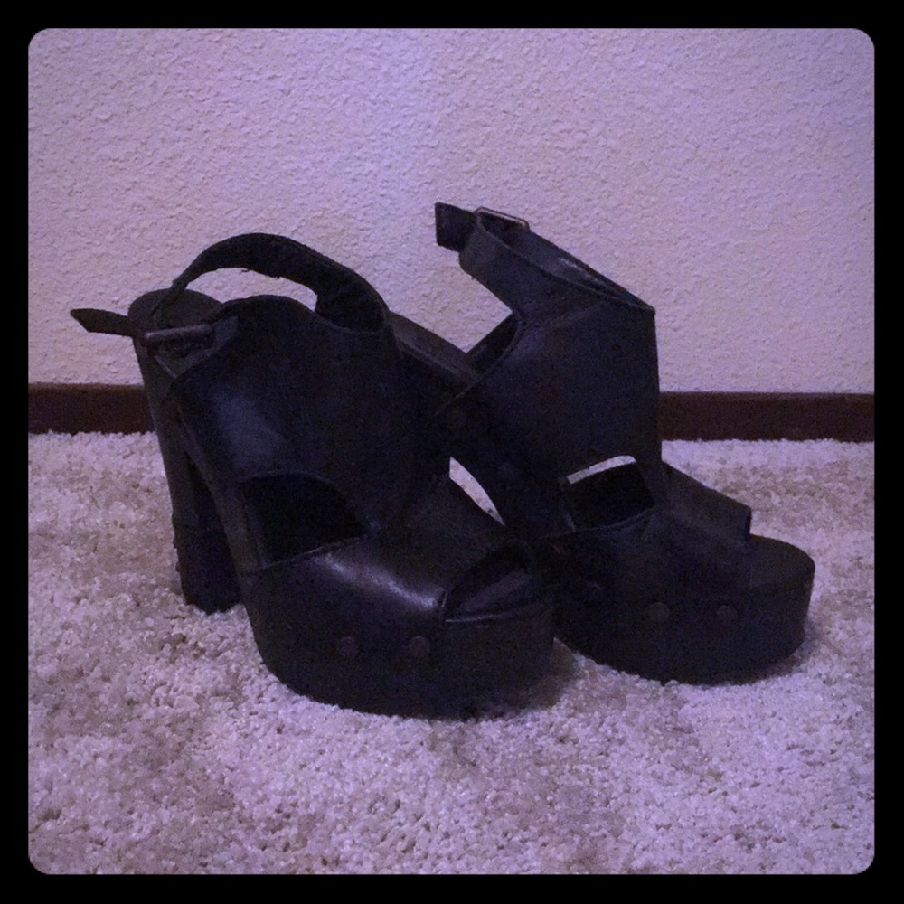 Calvin Klein “Terra” leather peep toe platforms
